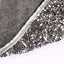 Silver gray sequin Christmas tree skirt displayed flat with shimmering surface detail