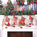 Holiday stocking ornament with snowflake and woodland creature motifs