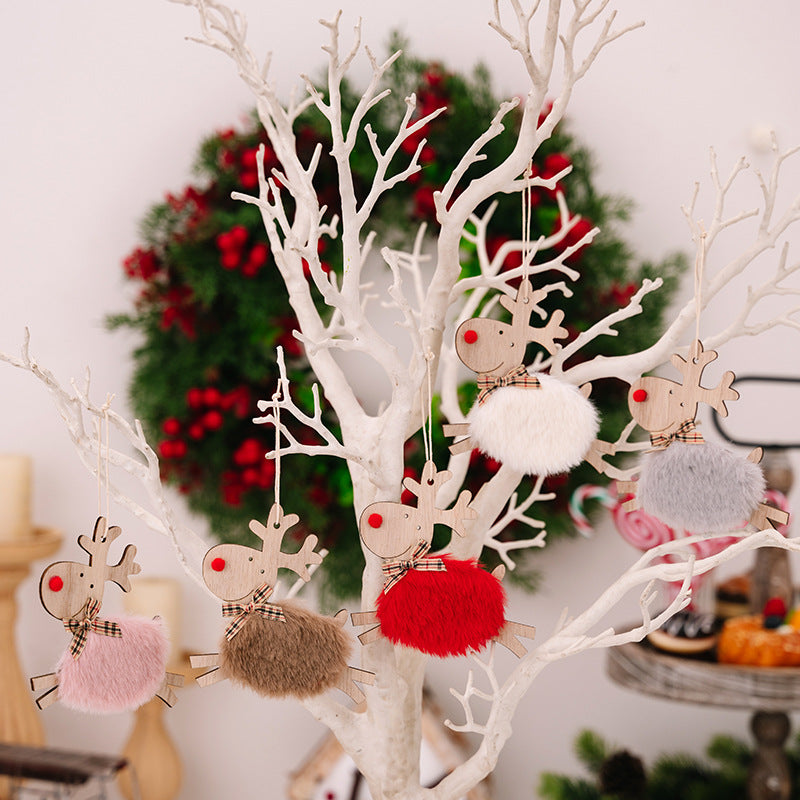 Red wooden running elk Christmas ornament on white background