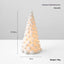 Luminous ceramic Christmas tree desktop decoration glowing softly for holiday ambiance