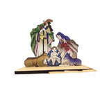 Close-up of wooden nativity figures showing the peaceful details of the manger group at Christmas