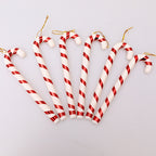 Colorful red and white Christmas tree crutches in holiday setting