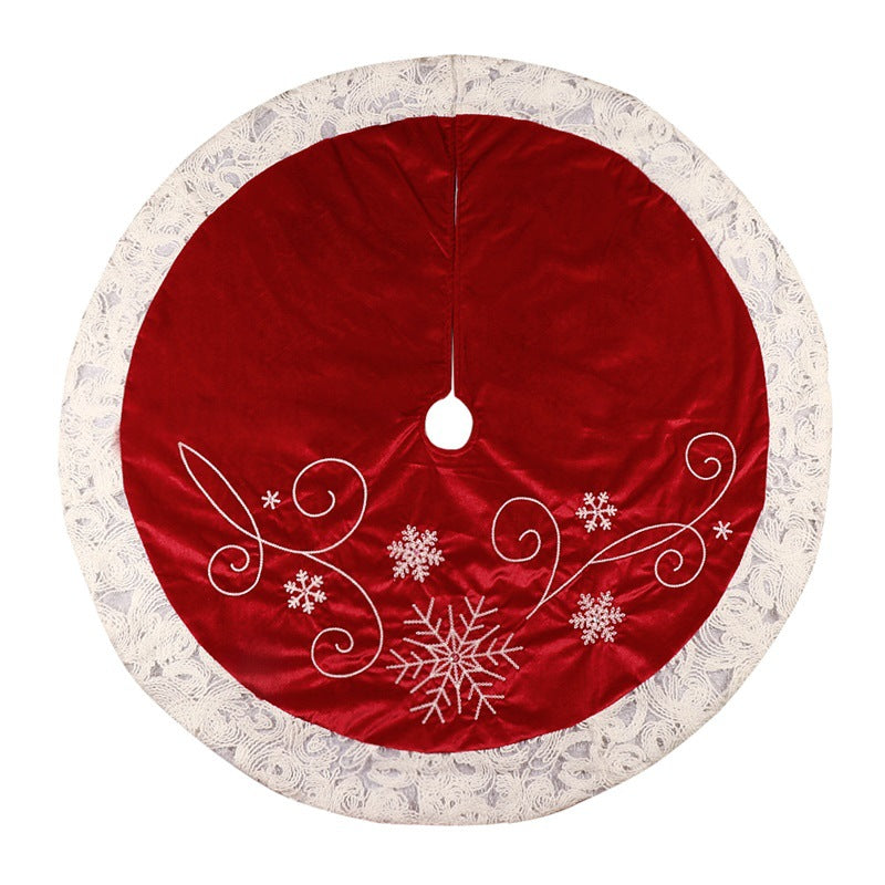 48-inch red velvet tree skirt with snowflake embroidery and lace trim in festive holiday setting