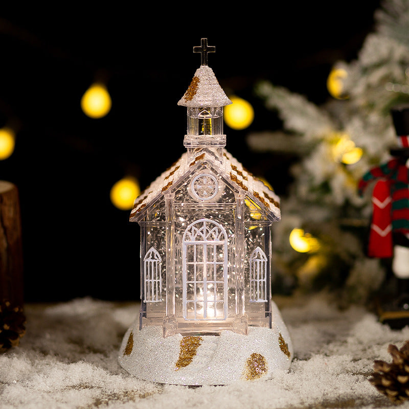 Crystal church music box ornament with warm lighting highlighting architectural details
