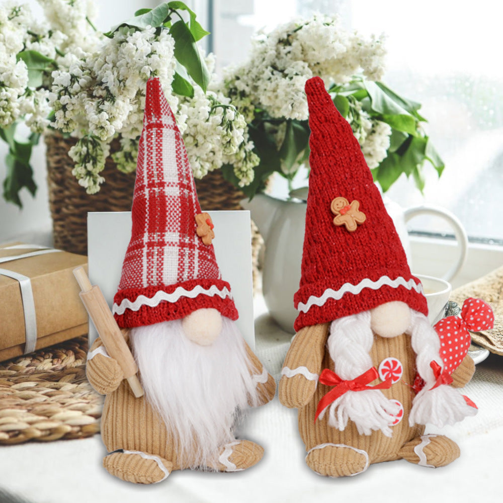 Christmas tree branch displaying multiple knitted elderly ornaments with holiday greenery