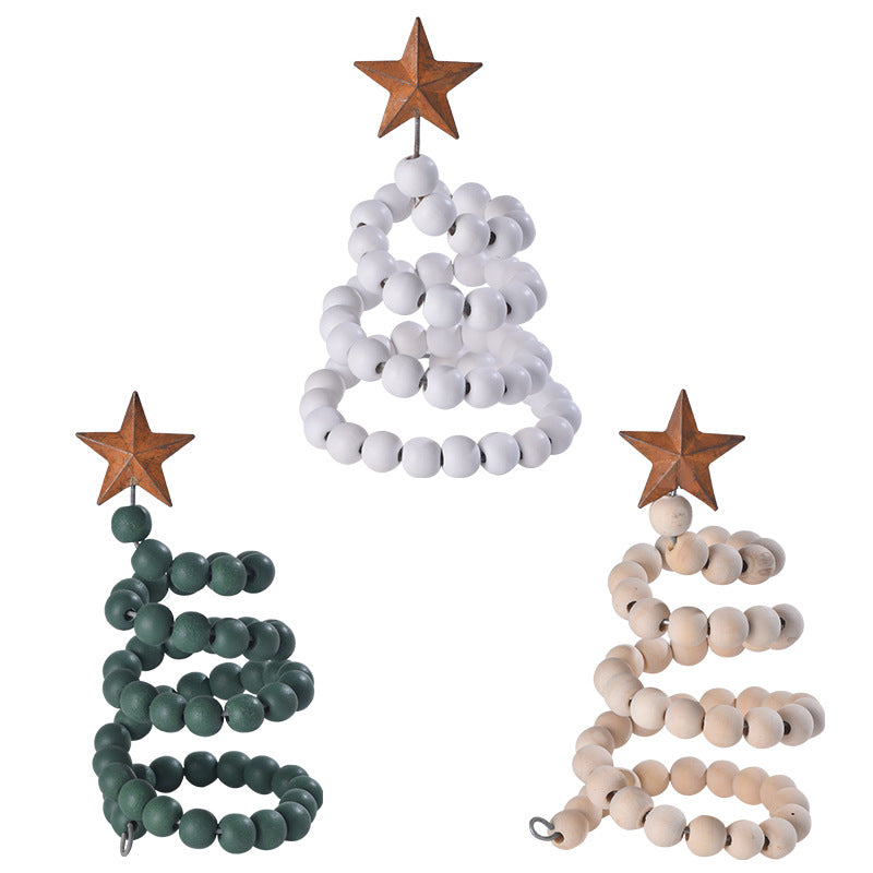 White and green wooden Christmas decoration ornaments close-up