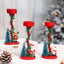Resin Christmas figurine on desktop with festive decor - Christmas Home Decor