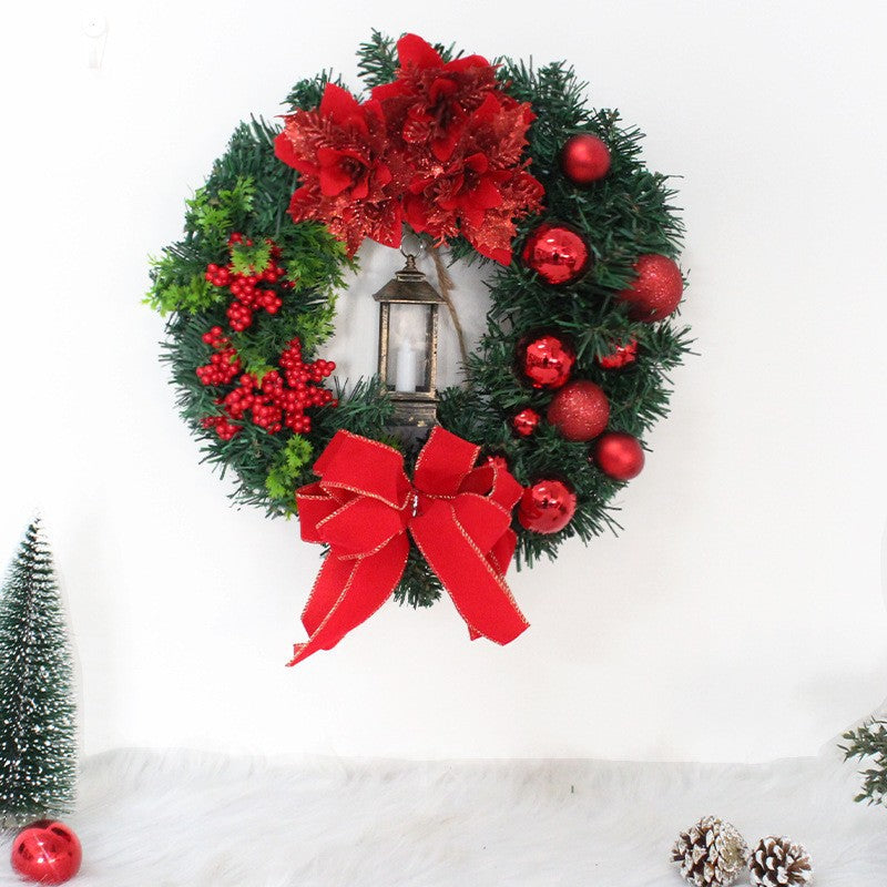 Close-up of Jesus Christmas wreath detail showing sacred figure centerpiece