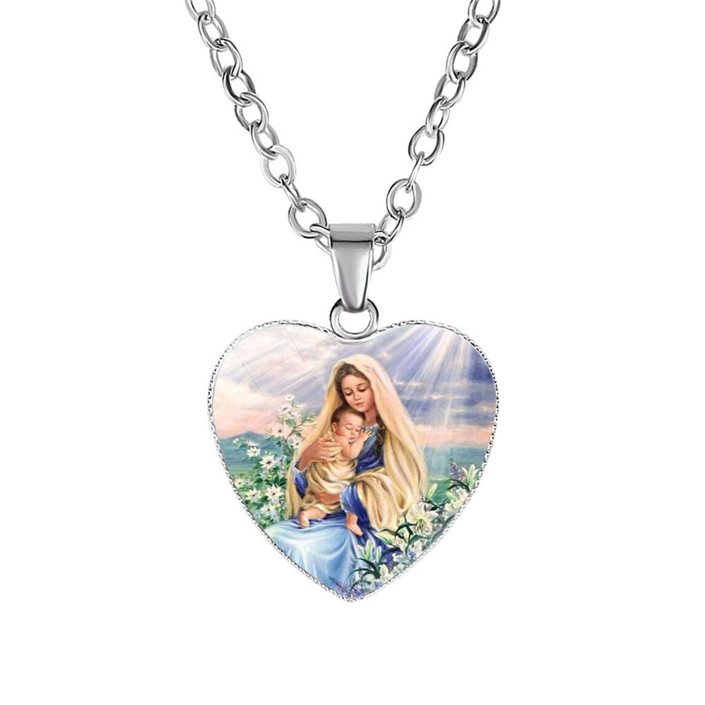 Religious heart pendant necklace with glass portrait detail