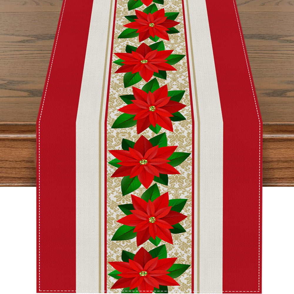 Festive Christmas table runner on decorated table with ornaments and candles
