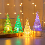 Small green Christmas tree lamp with colored lights