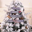 Five-pointed wooden star Christmas ornament with alphabet letters hanging on tree - faith Christmas decor