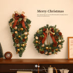 Illuminated Christmas wreath door hanging with gentle light for entryway