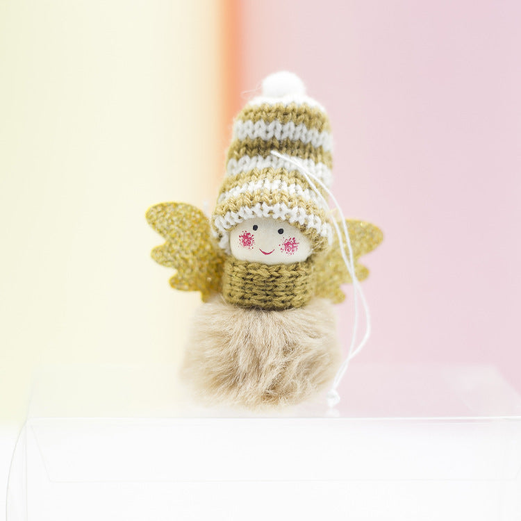 Red plush angel ornament bringing Christmas joy to any space