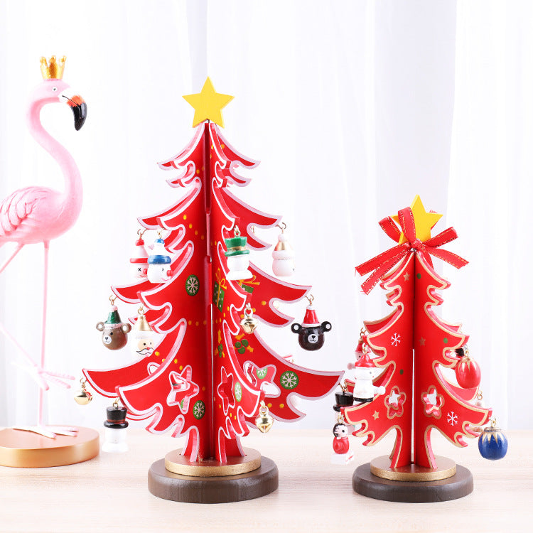 Christmas tree ornament collection in wood featuring various holiday-themed designs