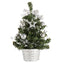 Mini desktop Christmas tree decoration on wooden surface with warm lighting for home