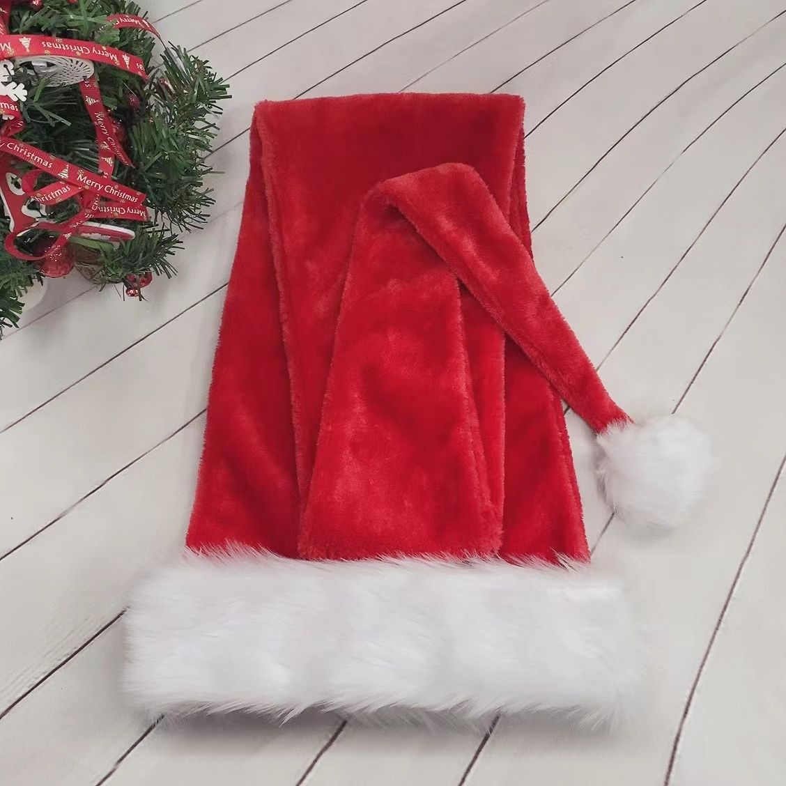 Cozy polyester Santa hat in festive red for holiday gatherings