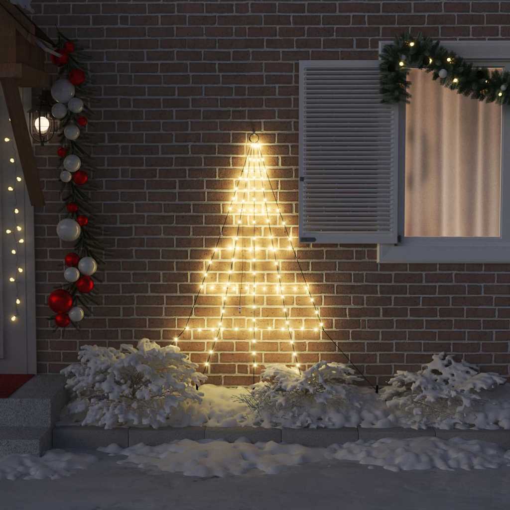 Metal LED Christmas tree in living room with warm white glow and festive decor