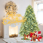 Green Christmas tree with LED lights displayed in a cozy home environment