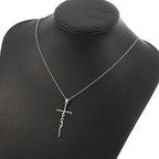 Jesus Cross Letter Pendant Necklace in gold tone against plain background