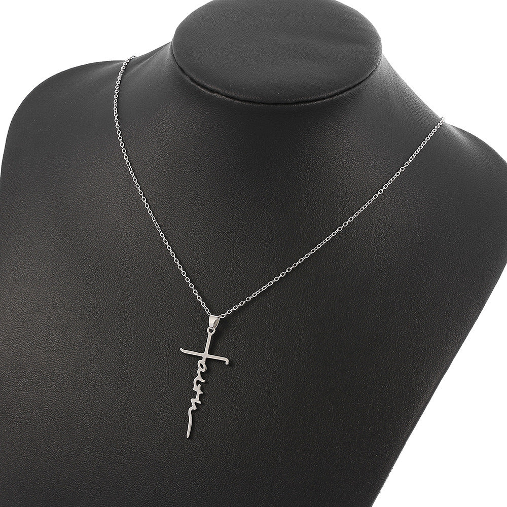 Jesus Cross Letter Pendant Necklace in gold tone against plain background