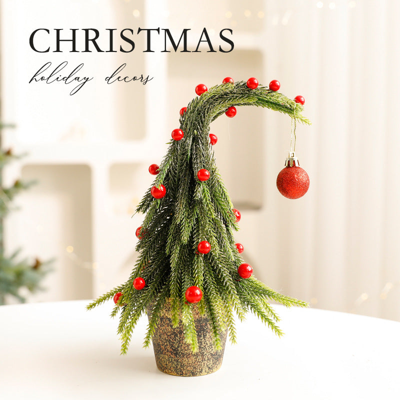 Holiday ornament showing curved Christmas tree design