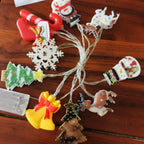 Glowing Christmas pendant lights displayed on festive background - Christmas Light Chain