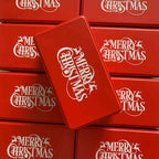 Cookie gift tin with red and gold pattern design on rustic table setting