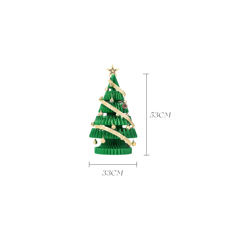 Nordic style paper origami Christmas tree ornament on white background