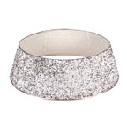 Christmas tree skirt sparkling with sequins creating luminous base for holiday decorations