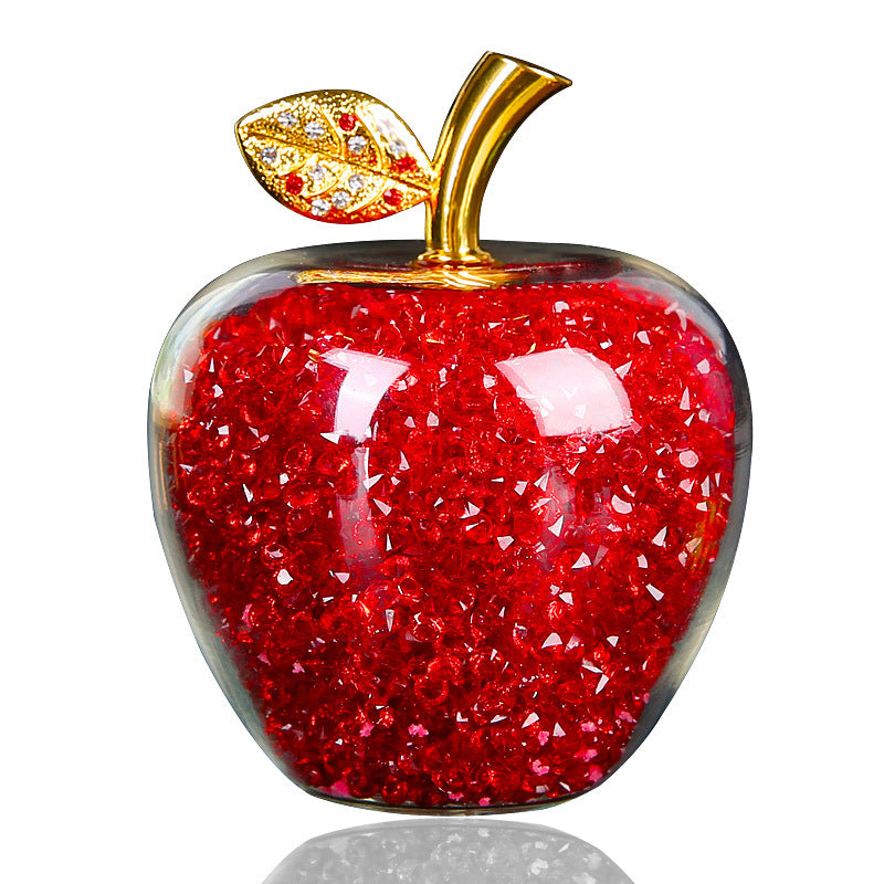 Crystal apple ornament with warm holiday lighting
