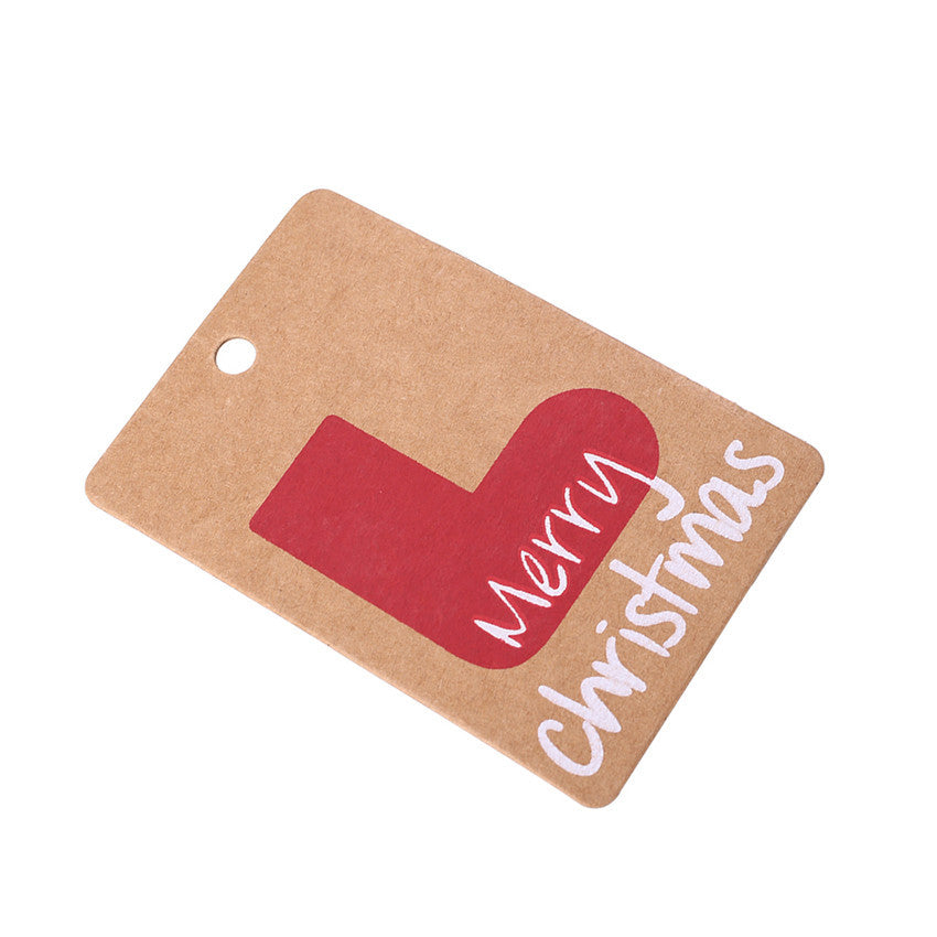 Kraft paper Christmas gift tags arranged for holiday gift wrapping