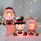 Wooden Christmas ornament featuring red-nosed elk design