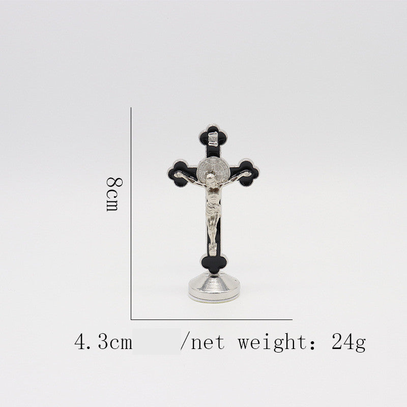 Compact Catholic cross ornament showing zinc alloy construction and detailed finish