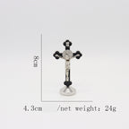 Compact Catholic cross ornament showing zinc alloy construction and detailed finish