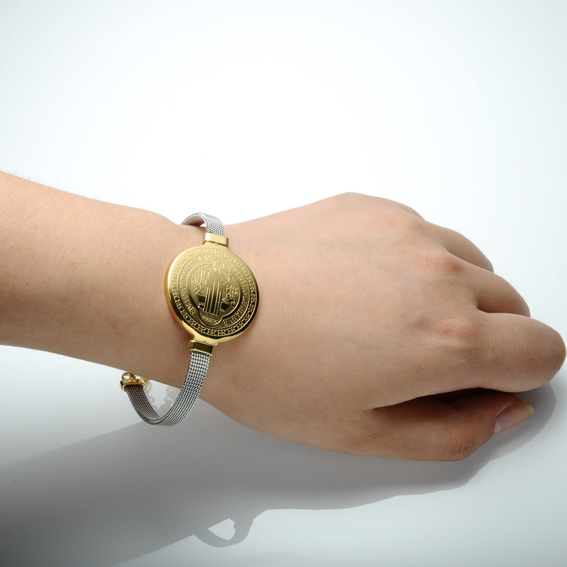 Saint Benedict religious accessory with golden electroplated finish