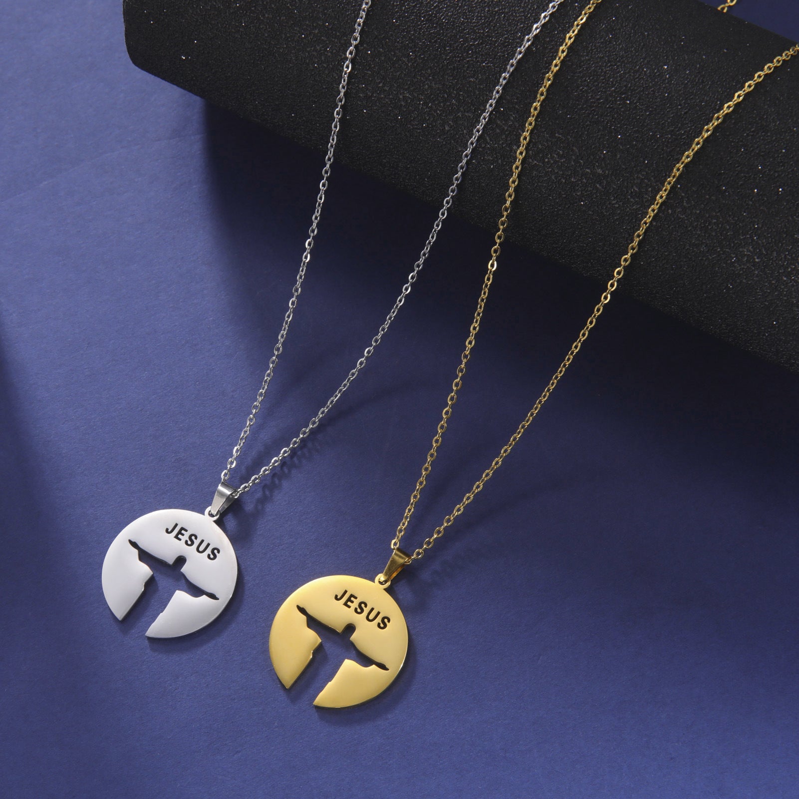 Close-up of hollow cutout Jesus text pendant design
