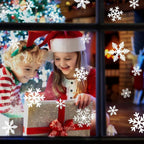 Christmas window decor with elegant white snowflake stickers creating a winter scene