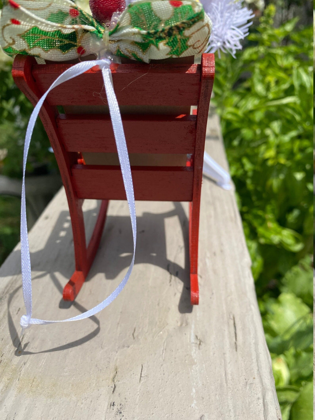 Close-up of Heaven Chair ornament showing poem text in rustic style
