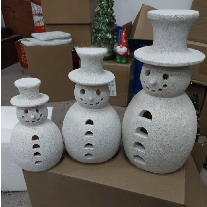 Medium-sized retro snowman ornament in warm holiday setting with ribbon detail