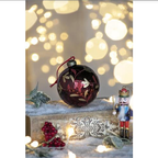 Christmas ornament showing Riccardo design details on red surface