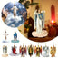 Jesus pendant hanging from car rearview mirror with light streaming through