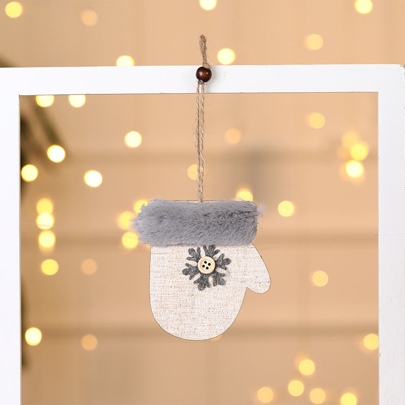 Wooden Christmas ornament pendant displayed as a meaningful seasonal accent in a warm setting